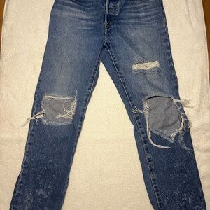 Distressed Blue Denim Jeans